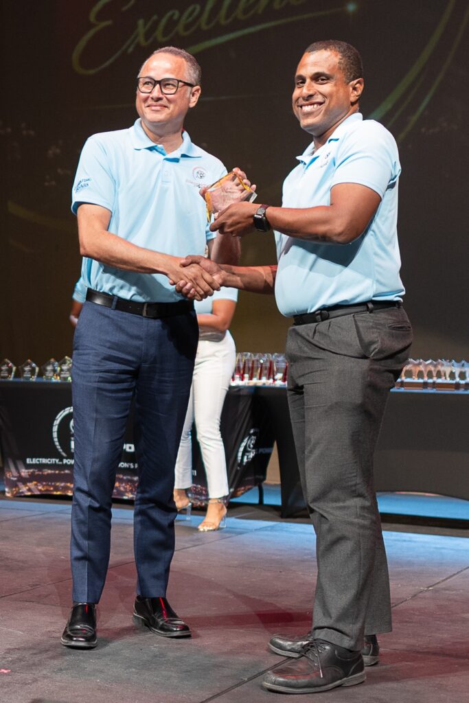 Light & Power managing director Roger Blackman (left) receives his long service award from Vice President, Operations, Johann Greaves. (PR/Mark Atkins)
